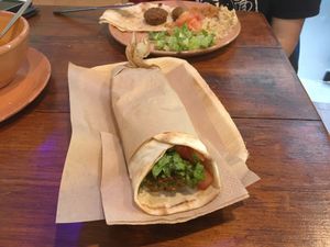 Falafel wrap and open plate at The Chickpea in Crete
