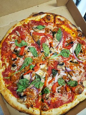 Large (14 in.) build your own - red sauce, v. chorizo, v. cheese, mushrooms, roasted red peppers, red onions, spinach, & fresh basil at Blaze Pizza in Canton