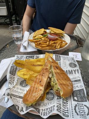 Front is my vegan 🌱 cubano with plantain tajadas, back is my Omni friend’s meal which could be customized with vegan options if wanted.  at Casa Yari in Chicago
