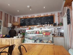 Menu and counter inside at The Road Shack Cafe in Peacehaven