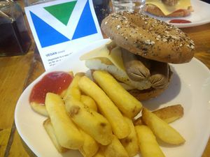 Loaded bagel - sausage, hash brown and tofu at The Road Shack Cafe in Peacehaven