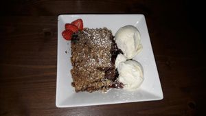 hazelnut-pear-crumble with icecream (vegan option) at The Walnut Tree in Eye