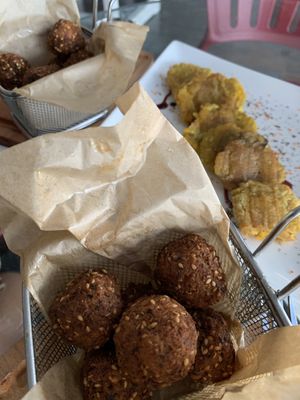 Falafel and tostones. Falafels comes with honey, ask without if you wish vegan dish.  at Azucar Lounge in Havana