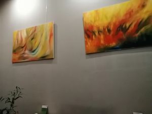 Pictures on walls at Oh My Green in Budapest