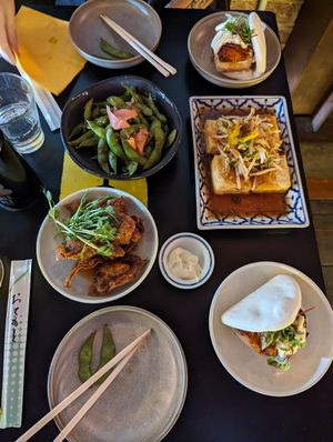 (clockwise from top left) Pumpkin Tofu Bao Bun, Mystery Tofu, another bao bun, gochujang jackfruit dumplings, edamame. at Lucky Chan's Laundry and Noodle Bar in Northbridge