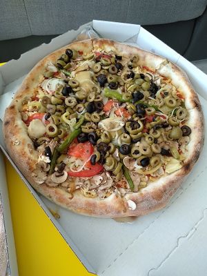 a lot of stuff on pizza at Pizzeria Doomsday in Zagreb