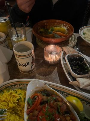 Moussaka with rice and salad (yummy), and tagine with couscous, then bread and olives in the middle at Bedouin in Cambridge
