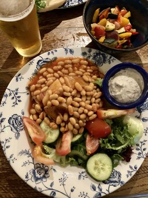 Jacket potato filled w/ backed beans. Roasted vegetable aside.  at The Linen Weaver  in Cork