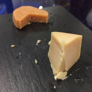 The lighter cheese in the foreground is Dall'Albero's signature cheese - the Anacardino. It's made with just four ingredients: cashews, water, salt, and live enzymes. The orange one in the background is made from almonds. at Dall'Albero in Rome