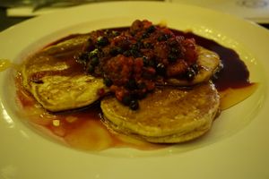 Vegan pancakes with berries and maple syrup  at The Fat Cyclist Cafe in Stirling