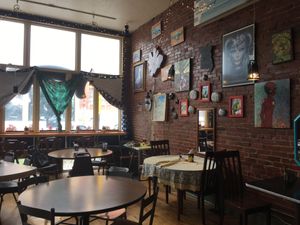 Eclectic decor. Lots of local art and a plastic dinosaur at almost every table at Gooseberries in St Louis