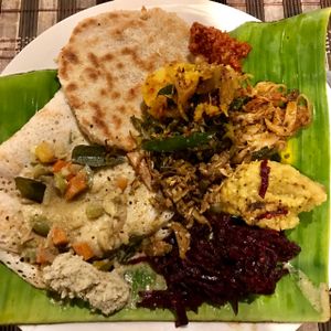 Few different curries served on banana leaf at Banana Leaf in Polonnaruwa