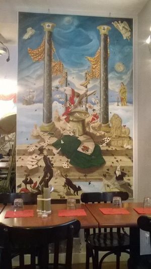 Painting exhibition in the restaurant room at La Palanche d'Aulac in Paris