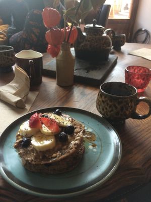 Amazing buckwheat pancake stack with a lovely oolong tea. Absolutely incredible! at Sukha Essentials in Bournemouth