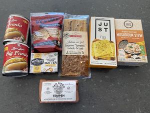 Big Franks! San Diego tempeh & mushroom 🍄 stew! Hard to find vegan options!  at San Diego Vegan Market in San Diego