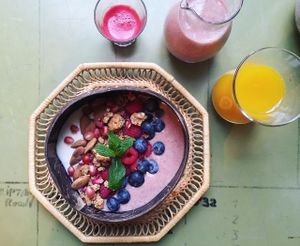 Vegan smoothiebowl with fresh Organic fruit and granola  at Oerwoud in Den Bosch