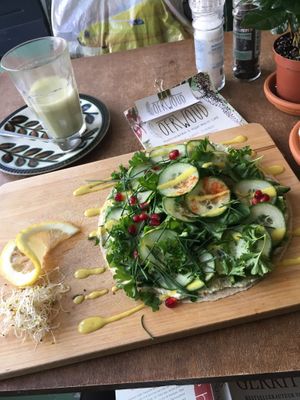 Oerwouds kruidentuin wrap + matcha latte  at Oerwoud in Den Bosch