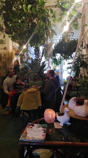 Sitting among plants at Oerwoud in Den Bosch