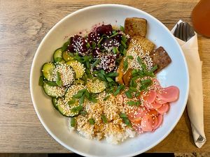 Spring bibimbap. Bowl of rice, tofu, beetroot and cucumber. 30 zł at Mihiderka - Józefa in Krakow