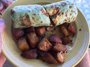 Breakfast burrito with potatoes. Delicious! at The Grain Cafe in Long Beach