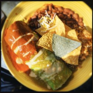 The wet burrito can be served with red sauce, green sauce, or both! at The Grain Cafe in Long Beach