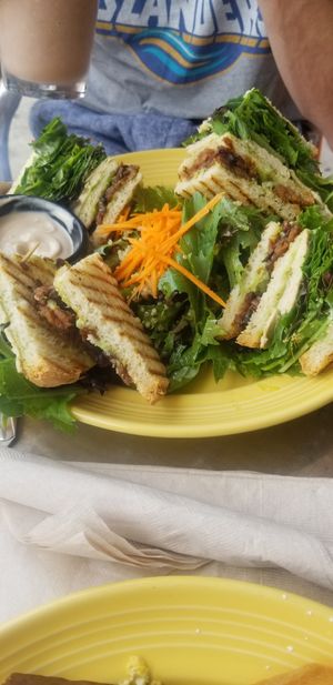 Club sandwich with salad at The Grain Cafe in Long Beach