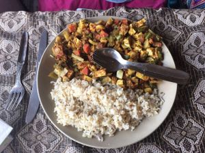 tofu curry with brown rice  at Tip Top Restaurant in Rishikesh