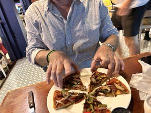 Half way thru the vegan pizza   at El Centro in Kota Kinabalu