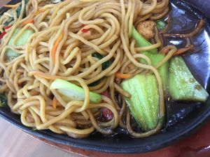 Noodles on hot plate at Alpukat Bistro in Jakarta