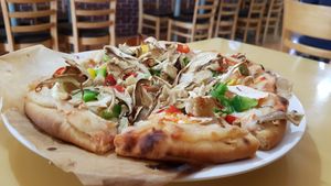 Pizza 6$ (taste a bit sweet) at Loving Hut Thai Duong in Phu Quoc