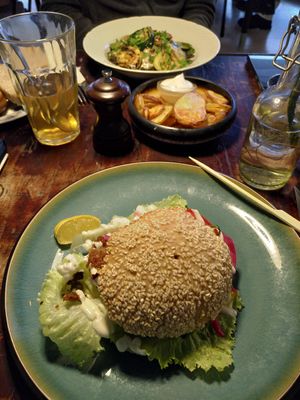 Burger, lentil salad and potatoes at Cafe Kosmos in Odense