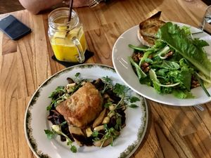 Mango juice, green salad and sous vide chicken  at Enso Cafe in Phnom Penh