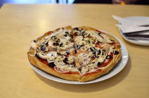 Kamut vegan pizza with mushrooms and cashew cheese at Black Kale in Ostrava