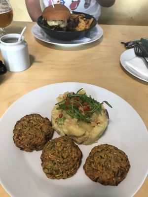 zucchini burgers with potato salad at Black Kale in Ostrava