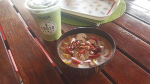 Smoothie with tumeric (dont remember the name, sorry) and strawberry cream smoothie bowl at Fruto Juice Bar in Kota Kinabalu