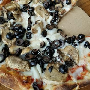 Small vegan cheese pizza with mushroom, olive, & onion at Pizza Palace in Milford