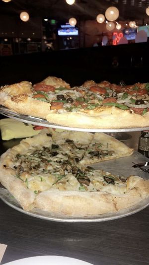 Veggie pizza & holy shiitake pizza-both vegan at Mellow Mushroom in St Louis