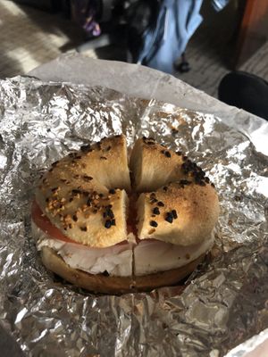 Garlic bagel, tofu cream cheese and tomato at Pick A Bagel in New York City