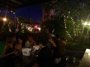 hang out with friends at the outside area amongst the greens at Bear Garden in Kuching