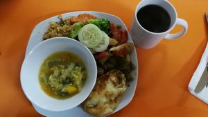 Quinoa, sopa, sofrito y yuca rellena at Vegetalia in Lima