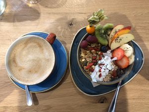 Breakfast Bowl with Cappuccino at Green Leaf Cafe in Erding