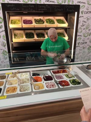 Part of the salad prep area; choice of 10 lettuces on the wall, 28 toppings below. at Greenbeat in Orlando