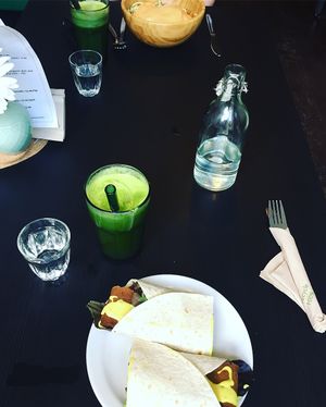 Seitan wrap and green juice  at Grassroots Health in Edinburgh