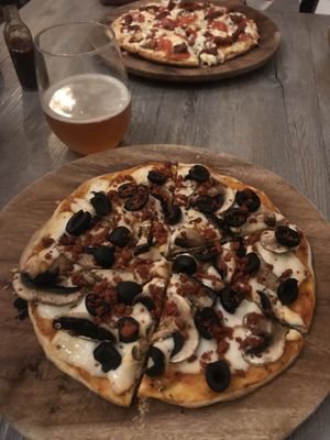 Pizza with mushroom, olives and chorizo  at La Matatena Pizzeria in Oaxaca