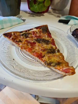 Amazing pesto pizza at Alice in Wonder Pie in Santiago De Compostela