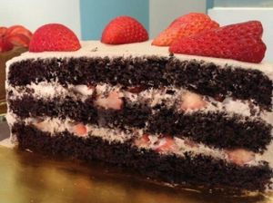 chocolate cake with whipped cream and strawberries (v)  at Alice in Wonder Pie in Santiago De Compostela