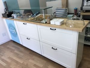 Front desk: some muffins and vegan pizza at Alice in Wonder Pie in Santiago De Compostela