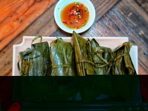 Delicious banana leaf wrapped rice and mushroom with Vegan Nước mắm. at Ans Vegetarian Cuisine  in Da Nang