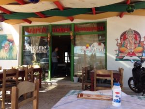 Entrance with outdoor seatings at Jaipur Palace in Santorini