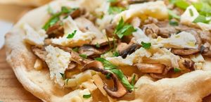 Pinsa with mix mushrooms and fresh mozzarella  at Pinsa & Co in The Hague